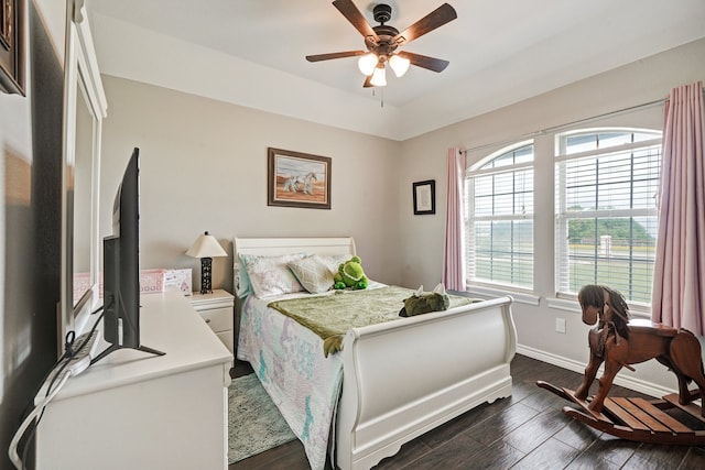 bedroom featuring dark wood-type flooring and ceiling fan