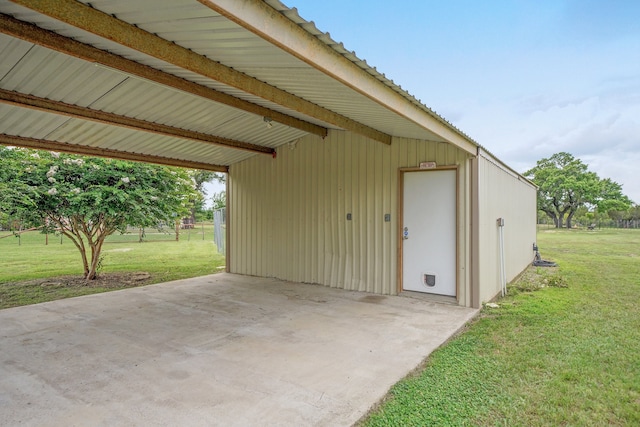 view of outdoor structure with a yard