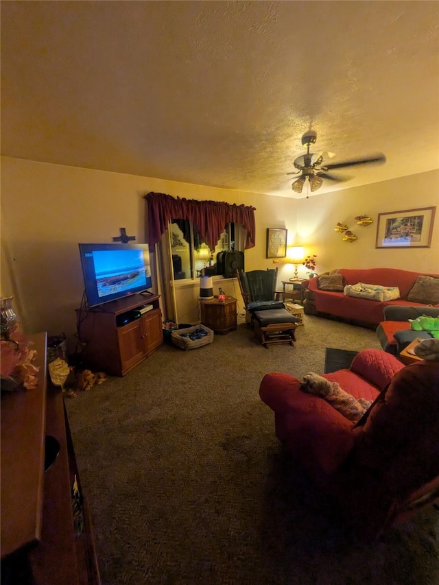 carpeted living room with ceiling fan and a textured ceiling