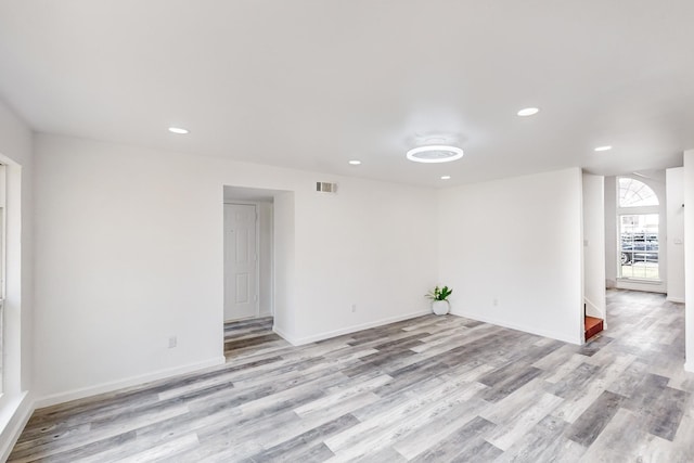 empty room with light wood-type flooring