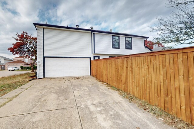 view of home's exterior featuring a garage