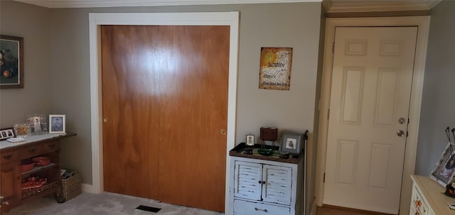 entrance foyer with crown molding