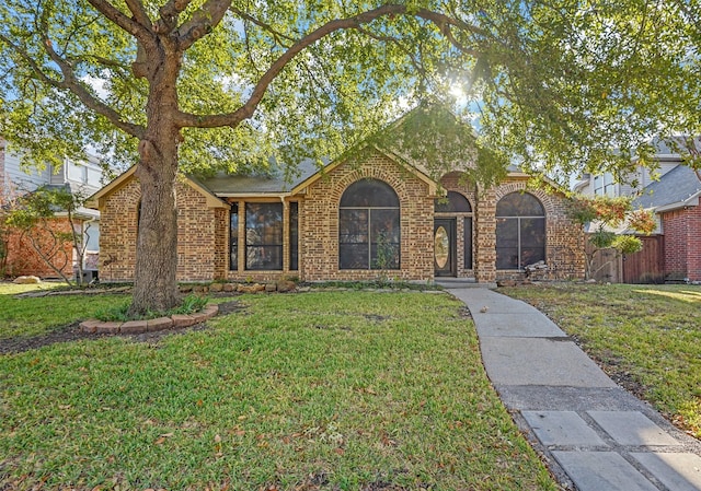 view of front of house with a front lawn