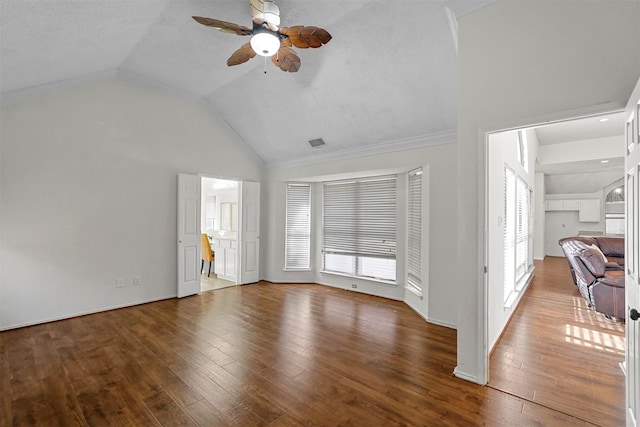 unfurnished living room featuring high vaulted ceiling, hardwood / wood-style floors, and ceiling fan