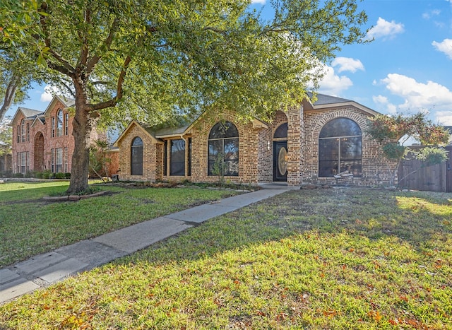 view of front of house with a front lawn