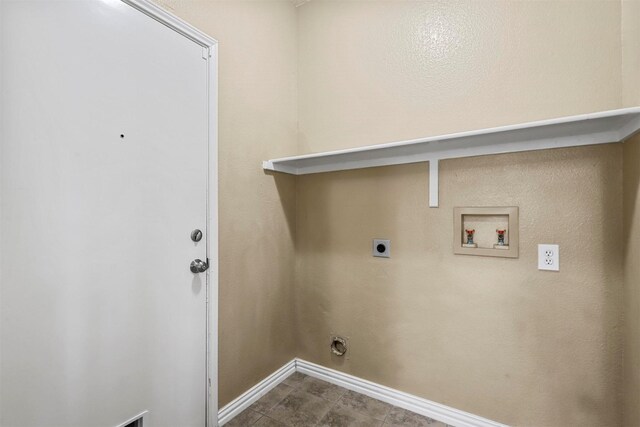 clothes washing area featuring washer hookup and electric dryer hookup