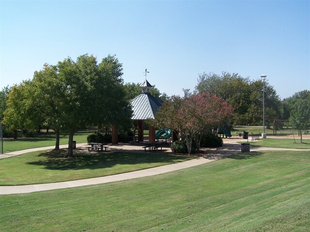 view of home's community featuring a lawn and a gazebo