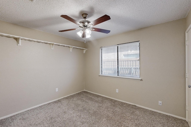 unfurnished room with light carpet, a textured ceiling, and ceiling fan