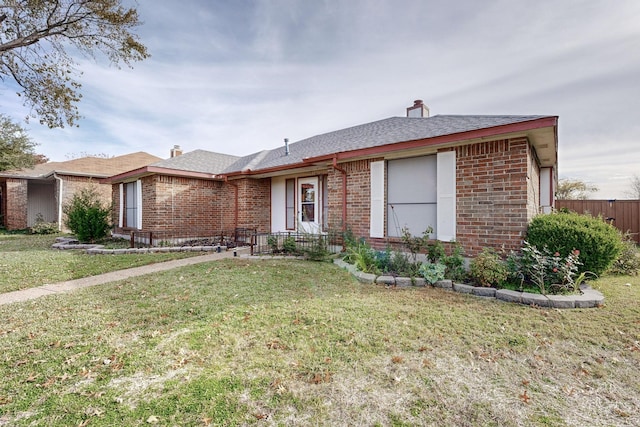 ranch-style house with a front yard