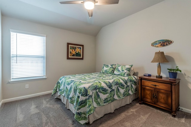 bedroom featuring light carpet, vaulted ceiling, and ceiling fan