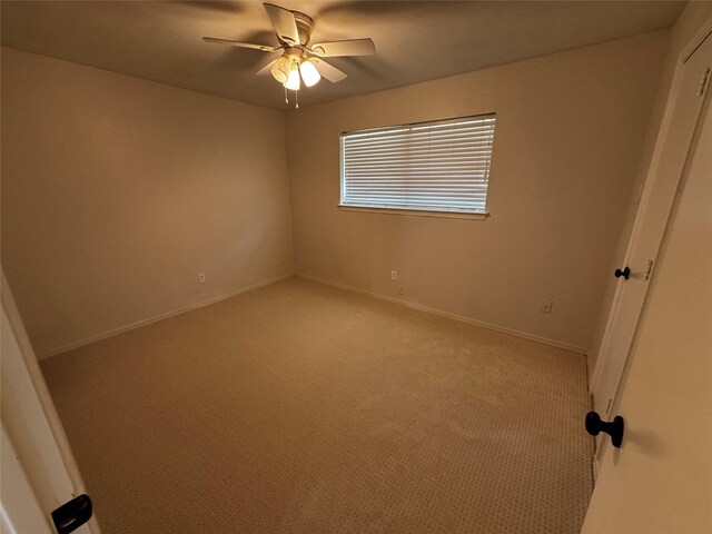1629 Jasmine Ln, Plano, TX 75074 - spare room featuring a ceiling fan and dark colored carpet