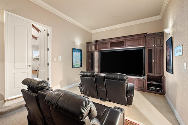 carpeted home theater room featuring crown molding