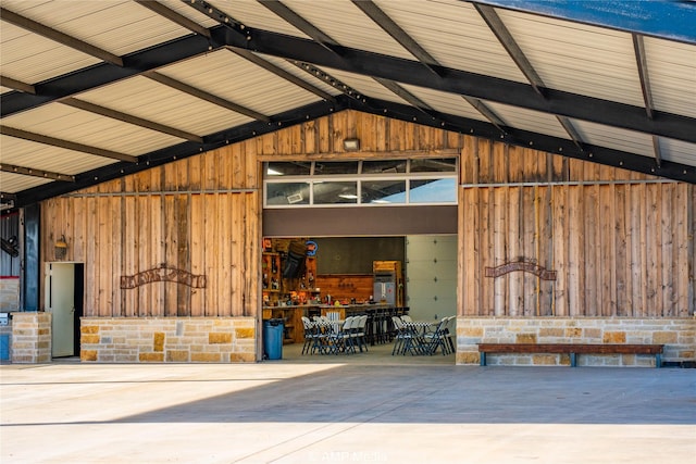 garage featuring wooden walls