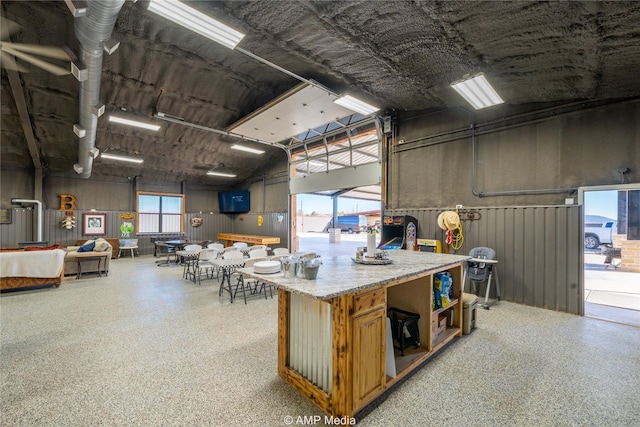 kitchen featuring a towering ceiling