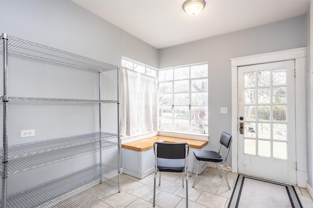 interior space featuring light tile patterned floors