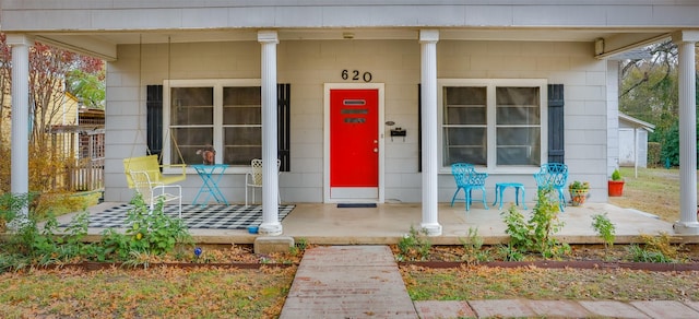 property entrance with a porch