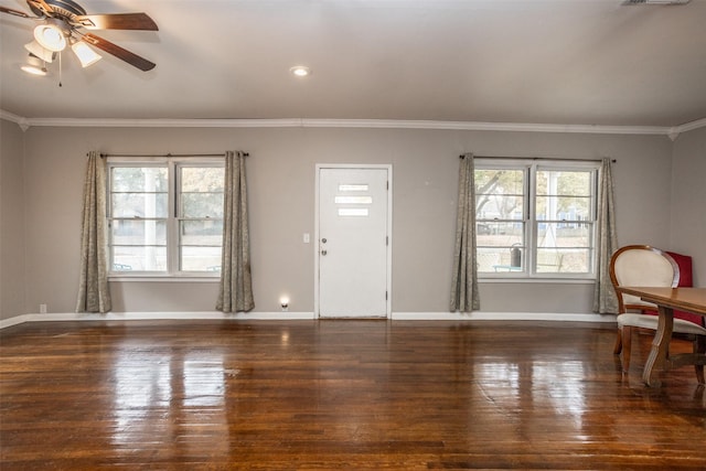 entryway featuring dark hardwood / wood-style floors, ceiling fan, and ornamental molding