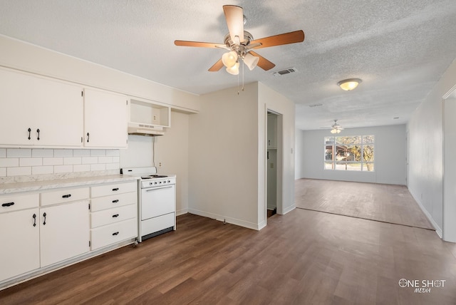 kitchen with white cabinetry, dark hardwood / wood-style flooring, range hood, white range oven, and backsplash