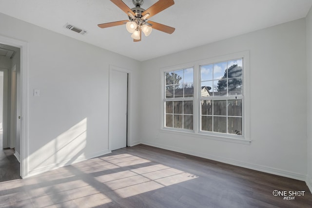 unfurnished bedroom featuring ceiling fan and hardwood / wood-style floors