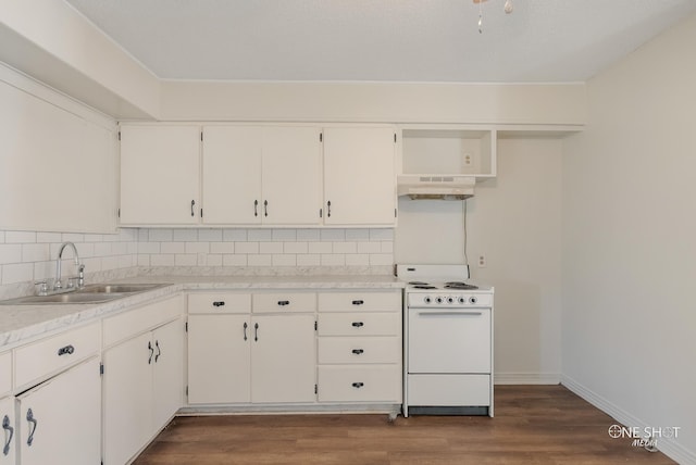 kitchen with stove, dark hardwood / wood-style flooring, exhaust hood, sink, and white cabinets