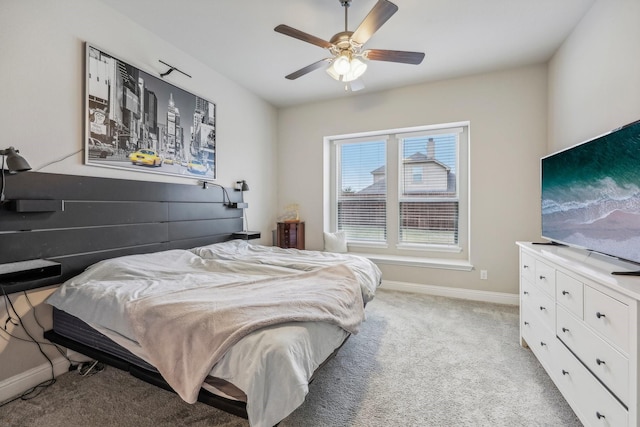 bedroom with light colored carpet and ceiling fan