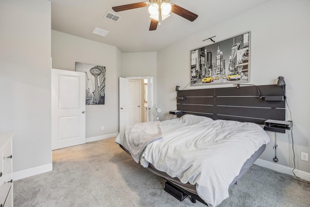 bedroom with ceiling fan and light colored carpet