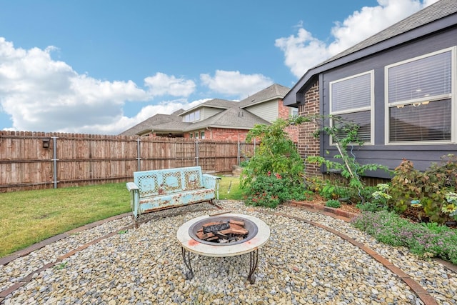 view of patio with an outdoor fire pit