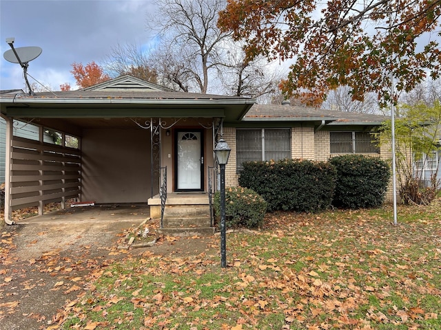 view of front of home featuring a carport