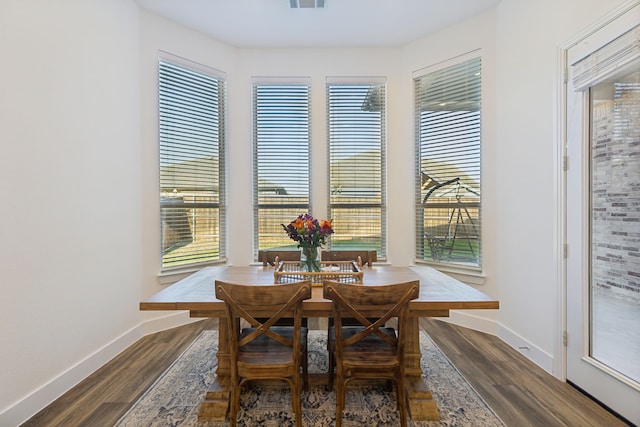 dining room featuring hardwood / wood-style flooring