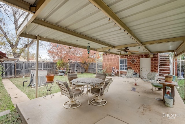 view of patio with ceiling fan