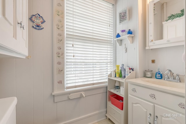 kitchen with white cabinetry and sink