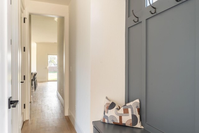 hallway featuring light wood-type flooring