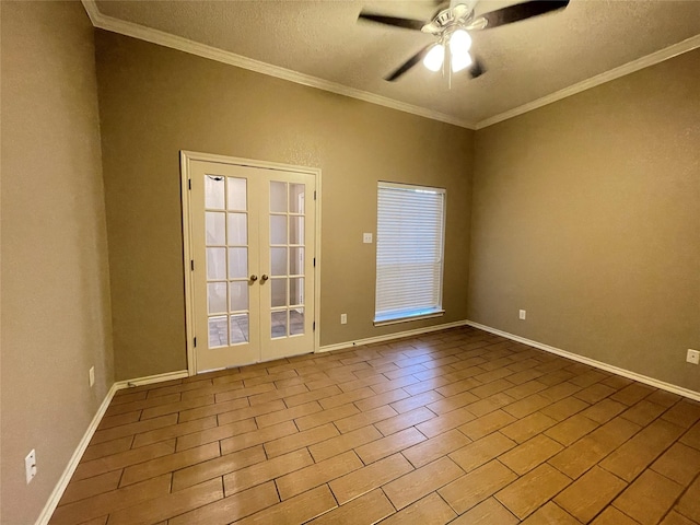 empty room featuring ceiling fan, french doors, a textured ceiling, and ornamental molding