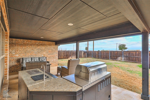 view of patio / terrace with an outdoor kitchen