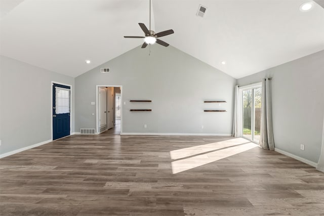 unfurnished living room featuring ceiling fan, wood-type flooring, and high vaulted ceiling