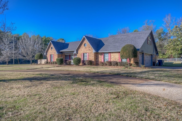 111 White Rd, Frierson, LA 71027 - view of front of property with a garage and a front lawn