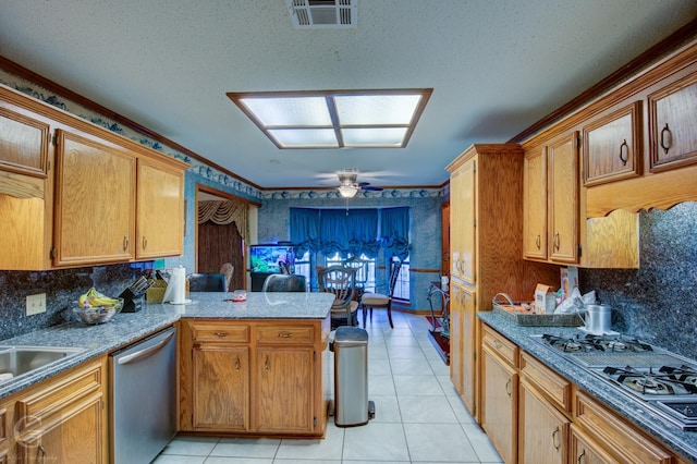 111 White Rd, Frierson, LA 71027 - kitchen featuring light tile patterned flooring, kitchen peninsula, dishwasher, black gas stovetop, and backsplash