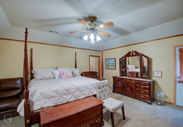 111 White Rd, Frierson, LA 71027 - bedroom featuring ceiling fan, ornamental molding, light carpet, and a textured ceiling
