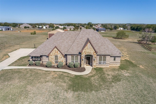 view of front facade with a front yard