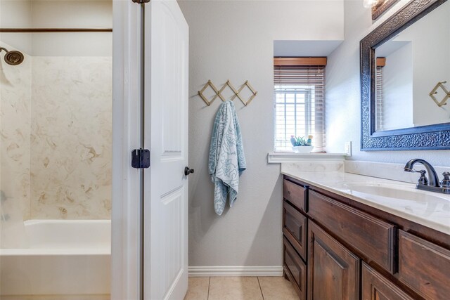 bathroom with tile patterned floors, vanity, and separate shower and tub