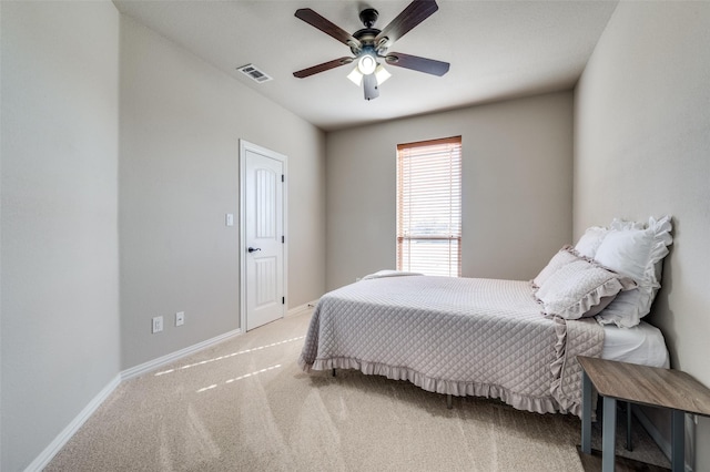 bedroom featuring ceiling fan and carpet floors