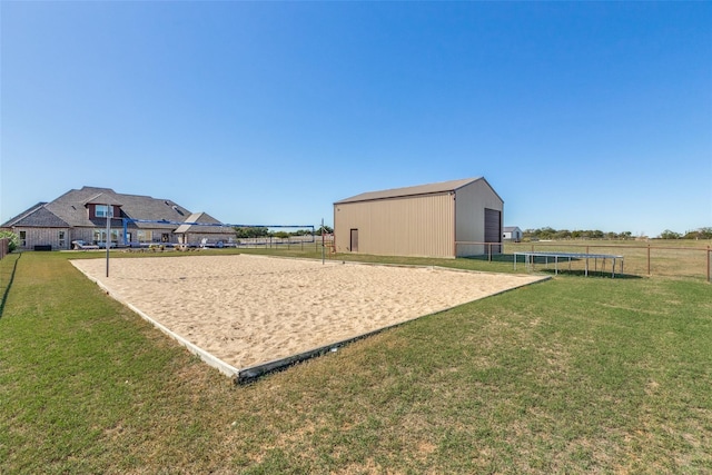 surrounding community featuring a rural view and a lawn