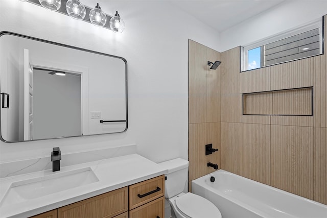 full bathroom with vanity,  shower combination, and toilet