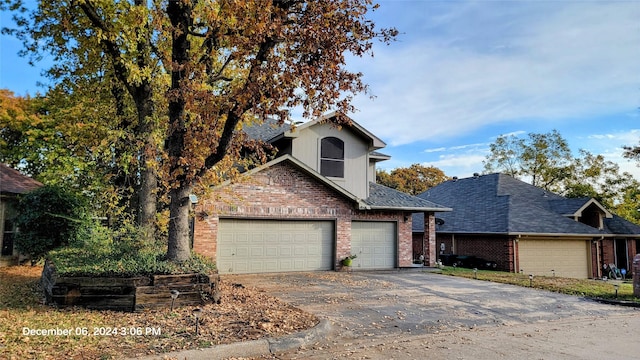 front of property with a garage