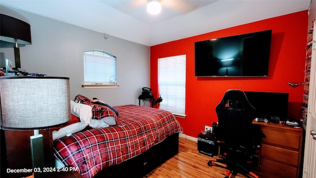 bedroom featuring hardwood / wood-style floors and ceiling fan