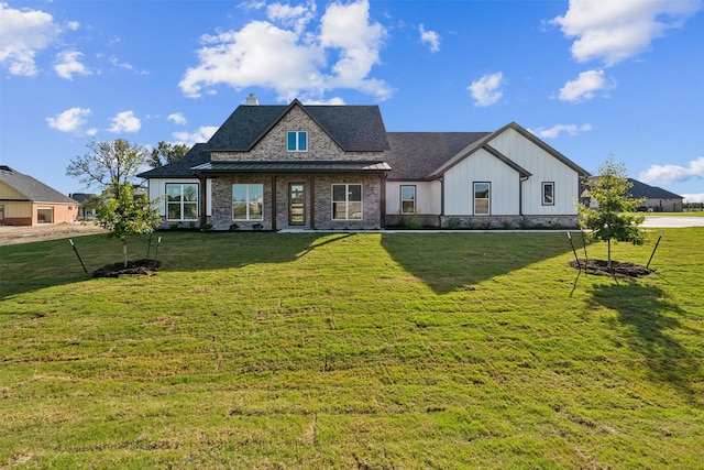 view of front of home with a front yard