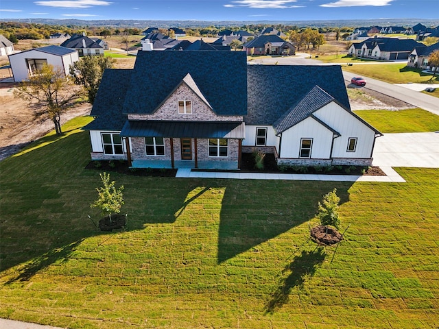 view of front facade with a front yard