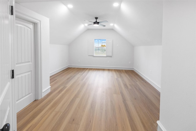 bonus room with ceiling fan, light hardwood / wood-style flooring, and lofted ceiling