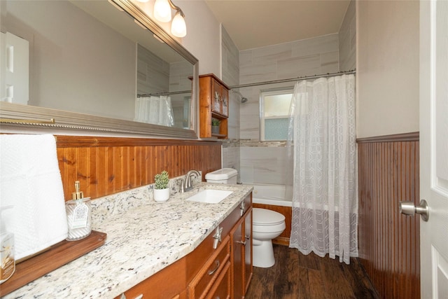 full bathroom featuring toilet, vanity, shower / bath combo, and hardwood / wood-style floors