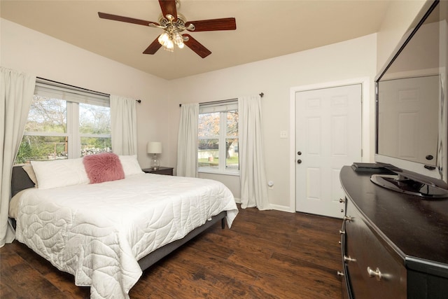 bedroom featuring ceiling fan and dark hardwood / wood-style floors